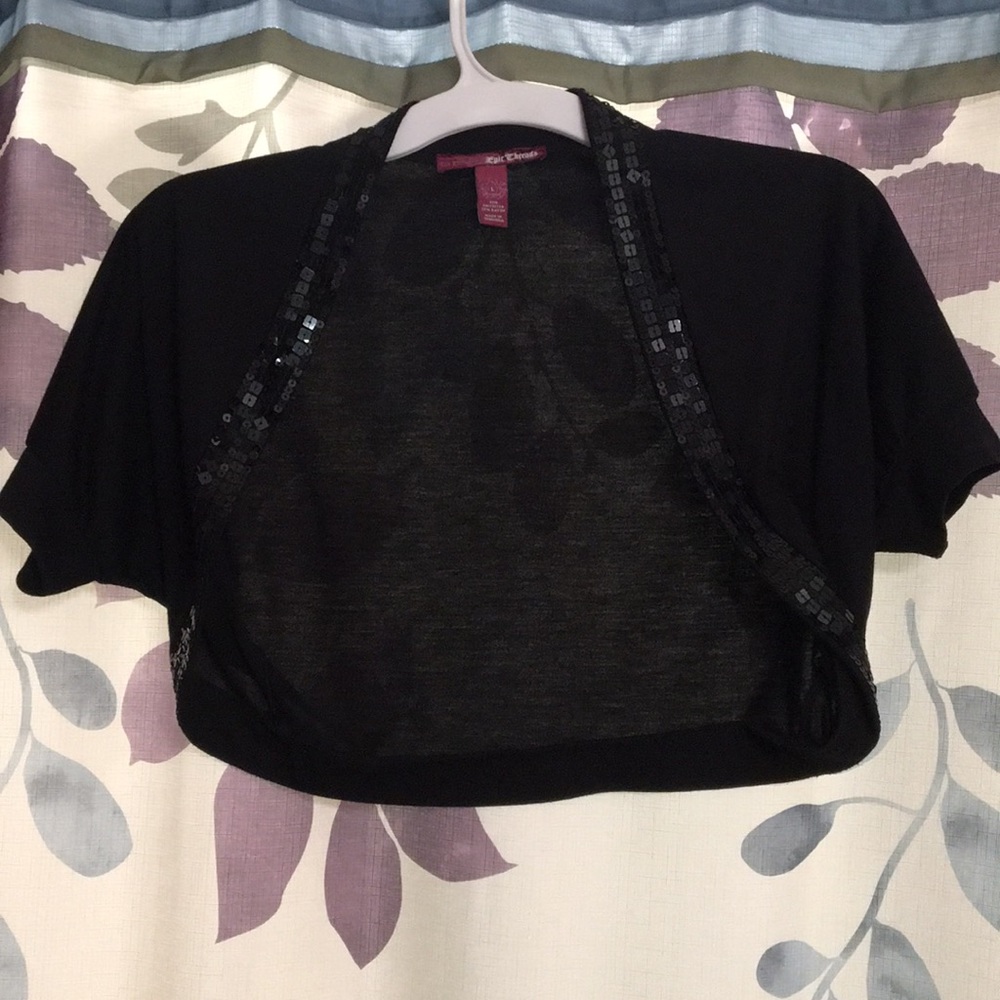 Sparkly, black cover